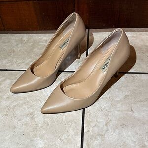 Nude pointed toe pumps